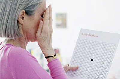 A woman holding a paper with a grid, possibly a medical chart, over her eyes, appearing confused or surprised.